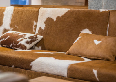 Cowhide print furniture, sofa in interior